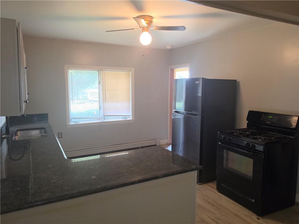 Multi Family at 1888 Mendon Road, Woonsocket, photo 16 of 18