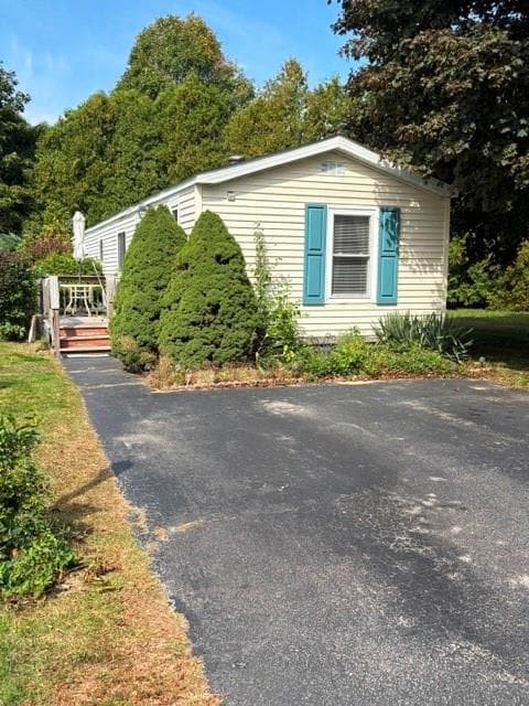 Single Family Residence at 8 Lear Drive, Coventry, photo 3 of 24