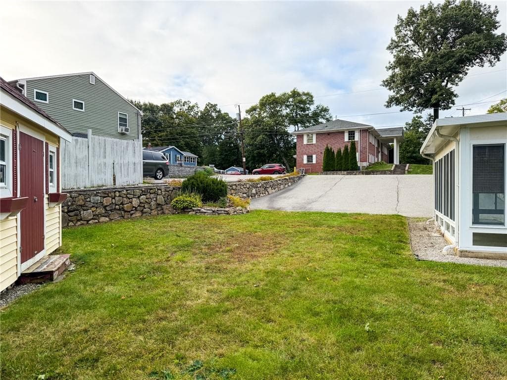 Single Family Residence at 411 Mendon Road, Woonsocket, photo 6 of 31