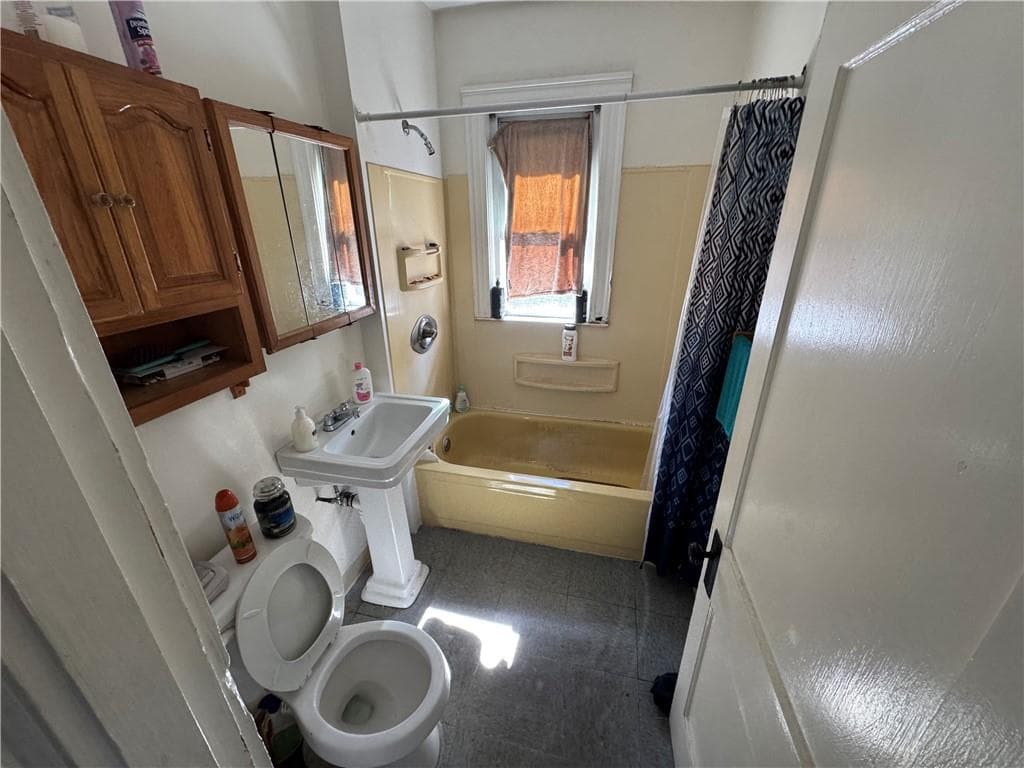 Multi Family at 377 Vose Street, Woonsocket, photo 11 of 16