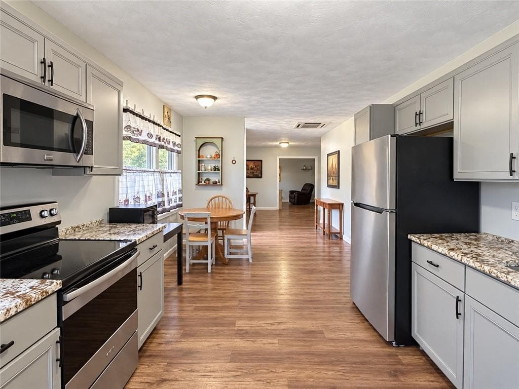 Single Family Residence at 3 Abbey Lane, Foster, photo 2 of 17