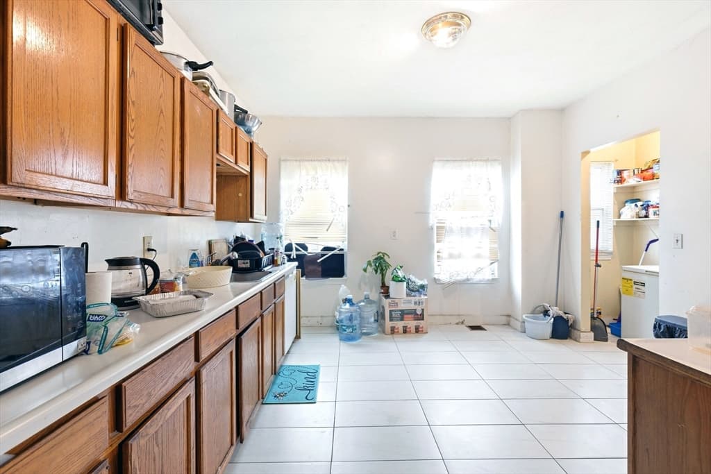 3 Family at 1023-A Blue Hill Ave, Boston MA 02124, photo 4 of 24