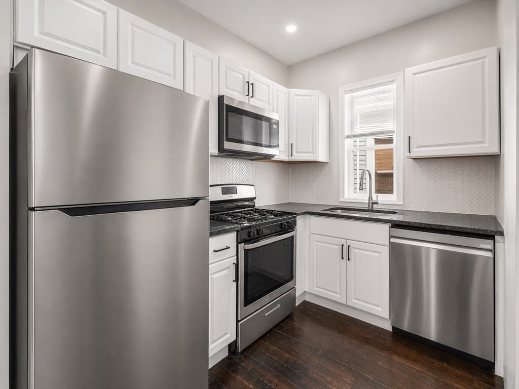 3 Family at 11 Priesing Street, Boston MA 02130, photo 8 of 12