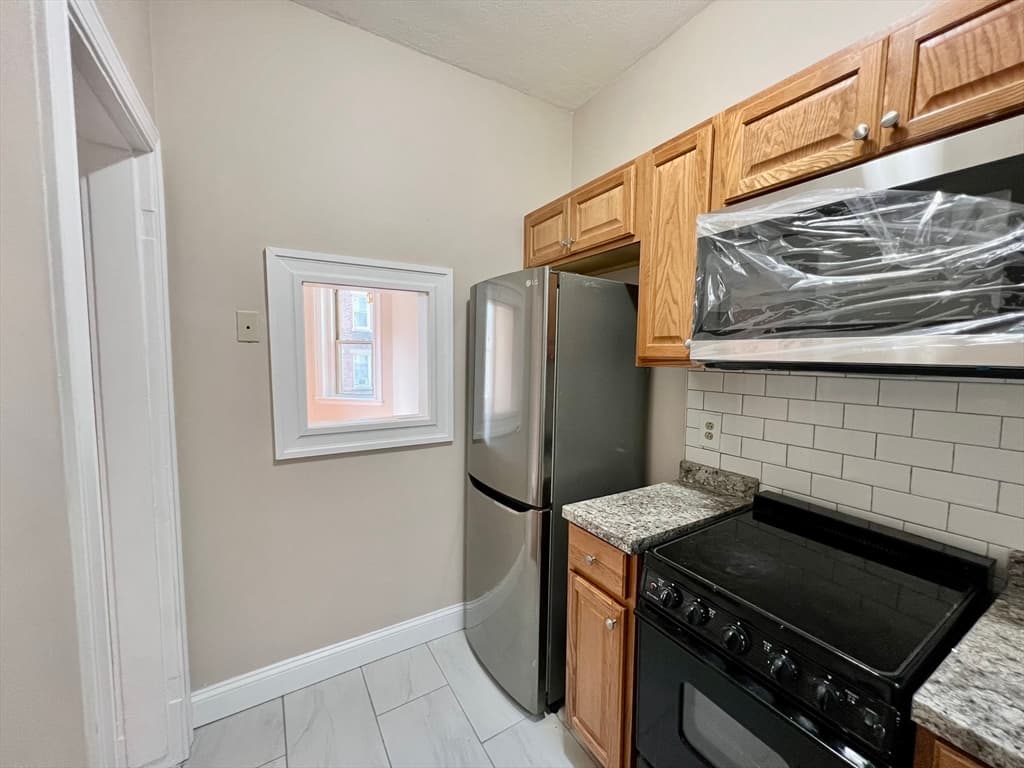 Condominium at 1669 Commonwealth Ave # 3, Boston MA 02135, photo 4 of 10