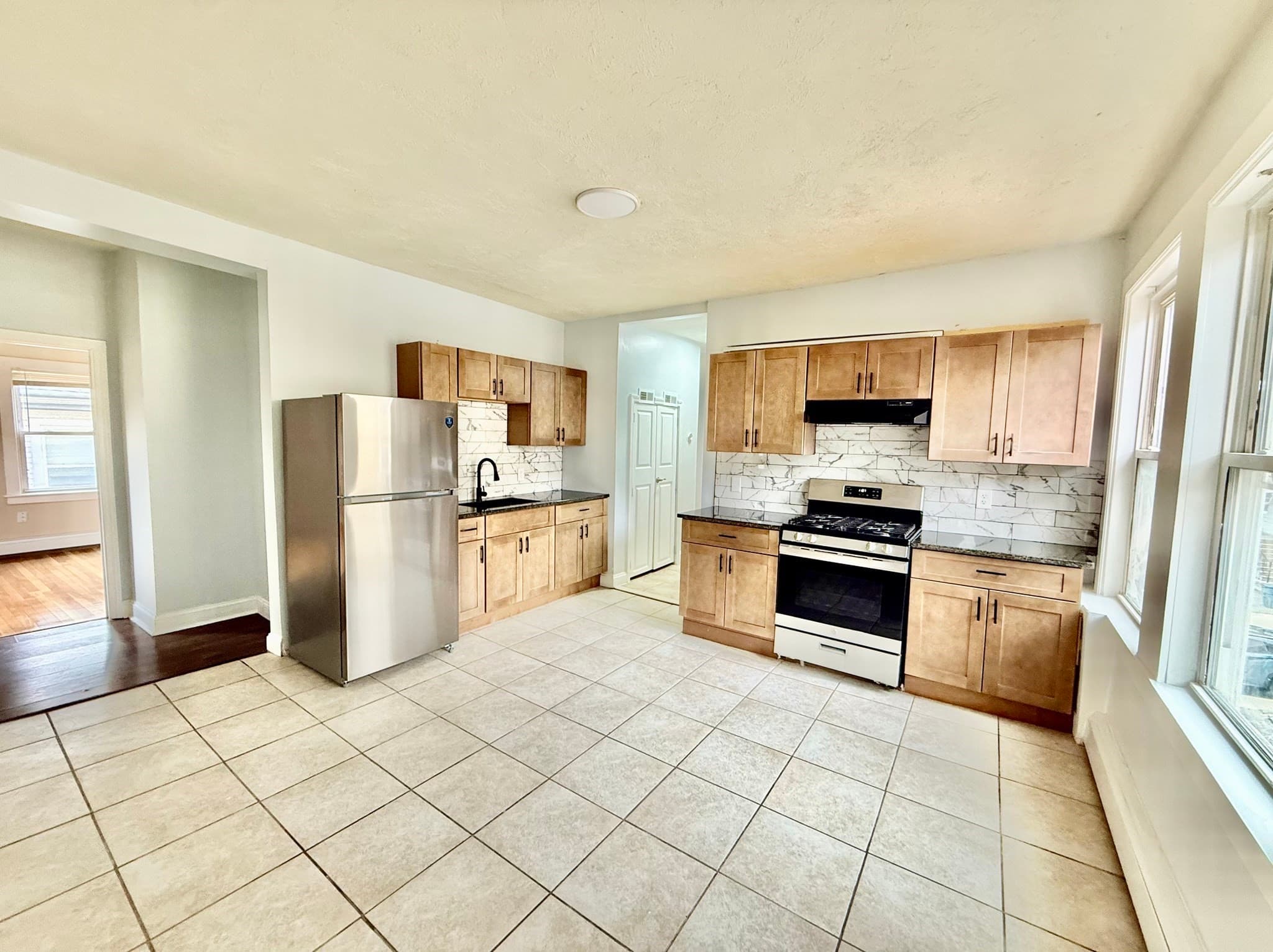 3 Family at 36 Spencer St, Boston MA 02124, Boston, photo 3 of 6
