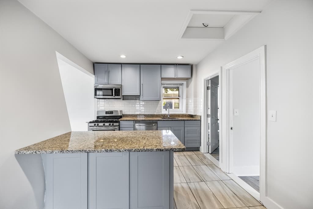 3 Family at 50 Perrin St, Boston MA 02119, photo 23 of 35