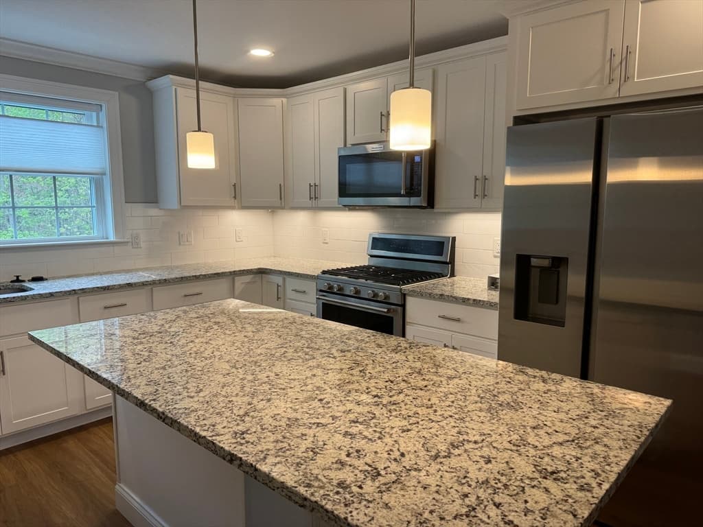 Condominium at 165 Cambridge Rd # 17, Woburn MA 01801, photo 3 of 25