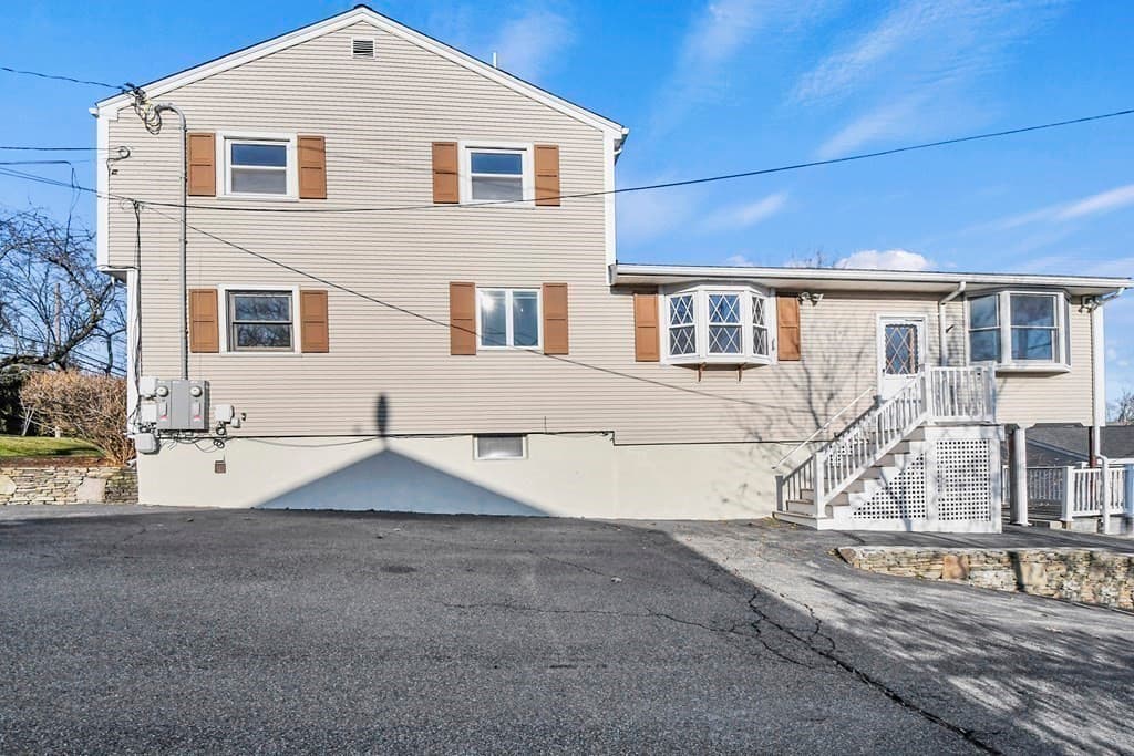Attached (Townhouse/Rowhouse/Duplex) at 72 Cambridge Road # 2, Woburn MA 01801, photo 2 of 31