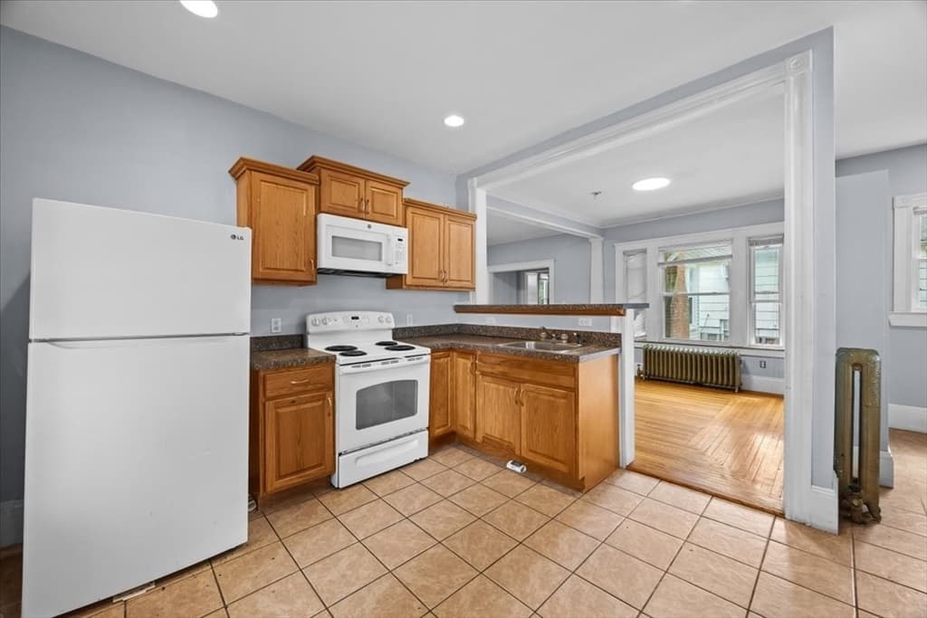 Single Family Residence at 229 W Chestnut St, Brockton MA 02301, photo 2 of 37