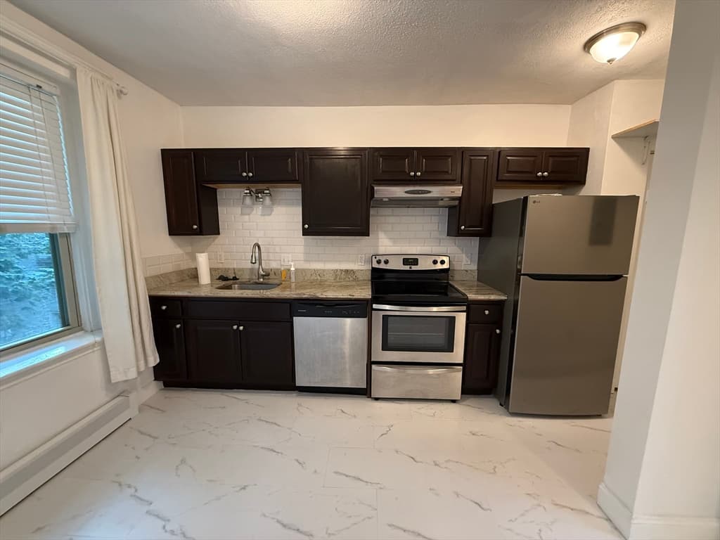 Condominium at 32 Ransom Rd # 11, Boston MA 02135, Boston, photo 7 of 15