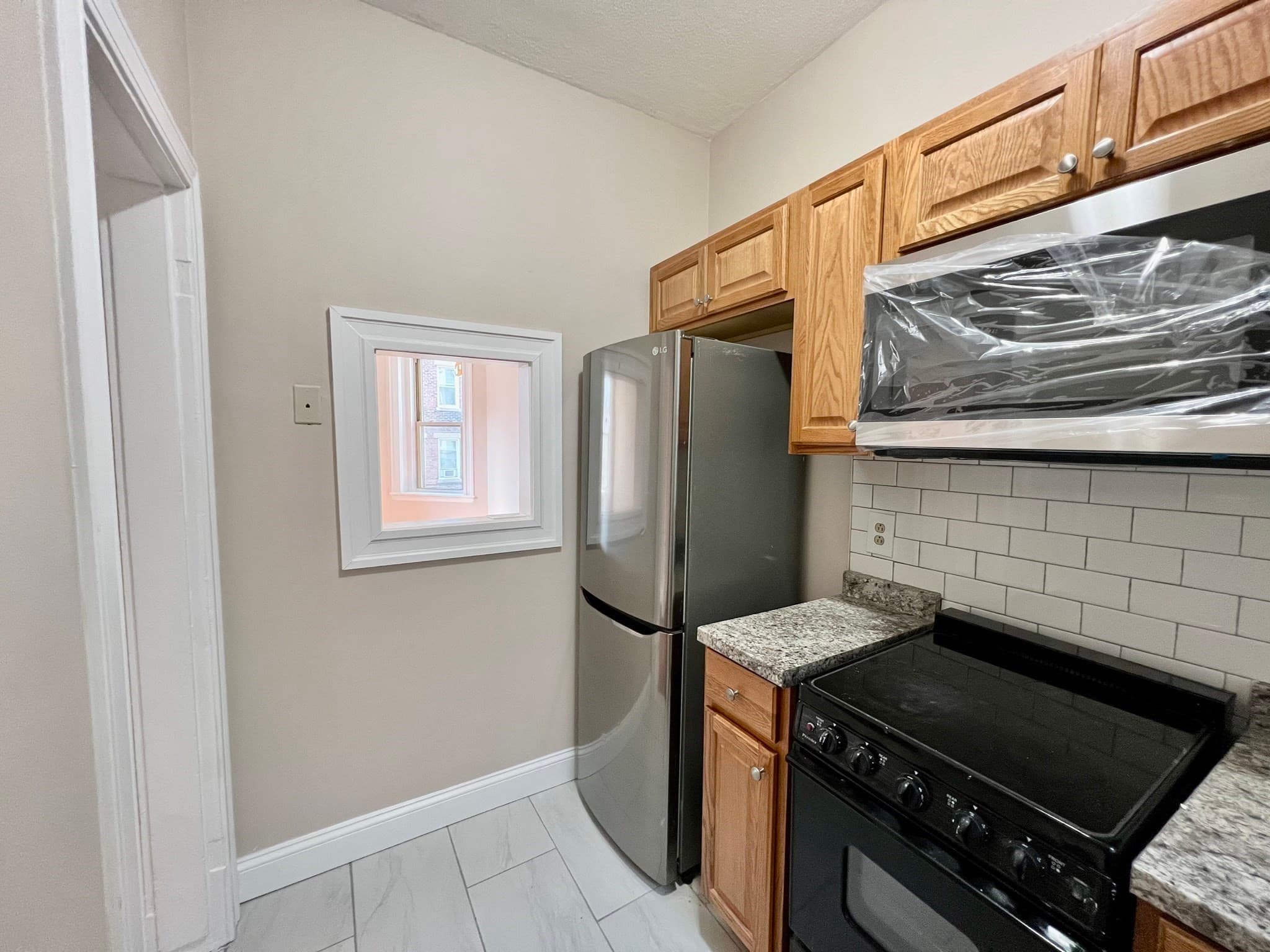 Condominium at 1669 Commonwealth Ave # 3, Boston MA 02135, photo 4 of 10