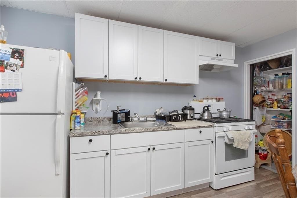 4 Family - 4 Units Up/Down at 411 Rathbun Street, Woonsocket RI 02895, Woonsocket, photo 7 of 42