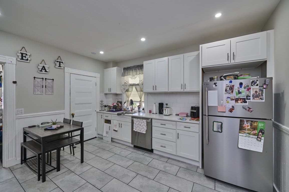 3 Family at 11 Wolcott Street, Boston MA 02121, photo 3 of 34