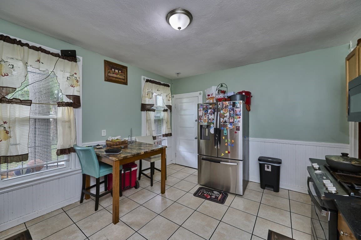 3 Family at 11 Wolcott Street, Boston MA 02121, photo 4 of 34