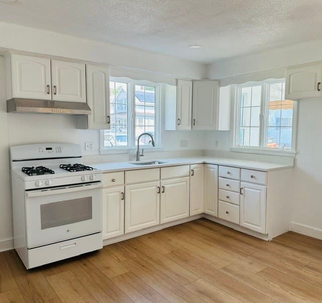 Single Family Residence at 159 Ludlam St, Lowell MA 01850, photo 12 of 25