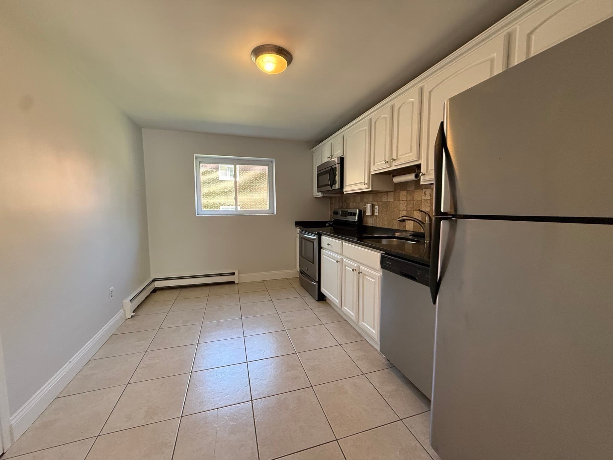 Condominium at 40 Bryon Rd # 4, Boston MA 02467, Boston, photo 4 of 22