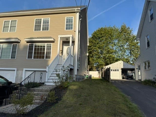 Attached (Townhouse/Rowhouse/Duplex) at 9 Grove Street # 1, Woburn MA 01801, photo 2 of 33