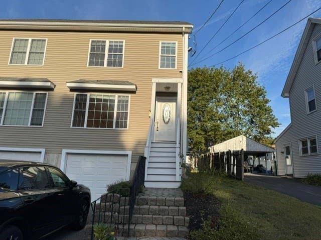 Attached (Townhouse/Rowhouse/Duplex) at 9 Grove Street # 1, Woburn MA 01801