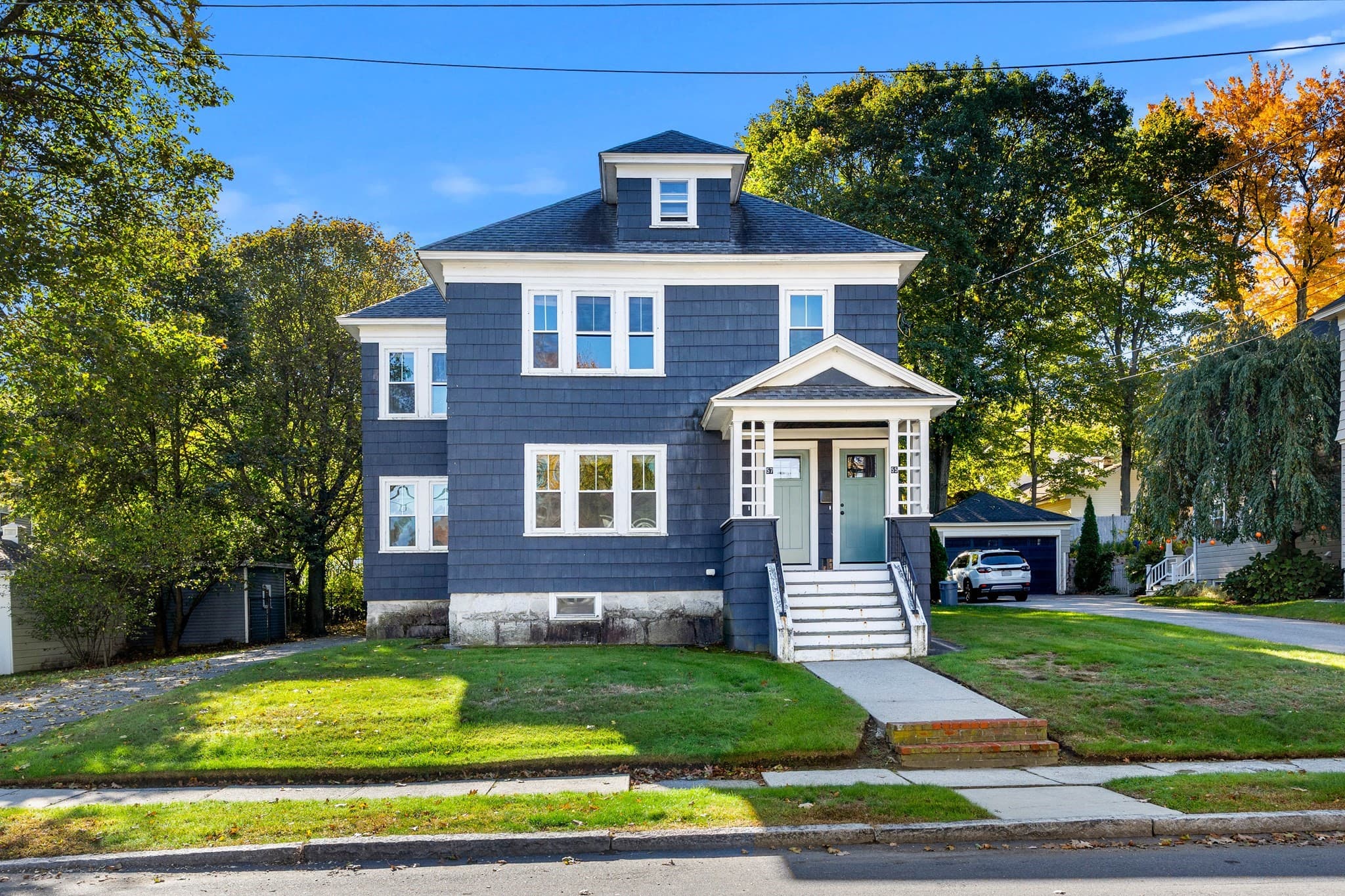 2 Family - 2 Units Up/Down at 55-57 Frothingham St, Lowell MA 01852, photo 2 of 42