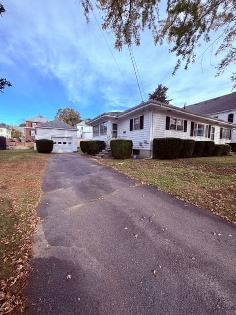 Single Family Residence at 112 Fisher St, Lowell MA 01850, photo 4 of 14