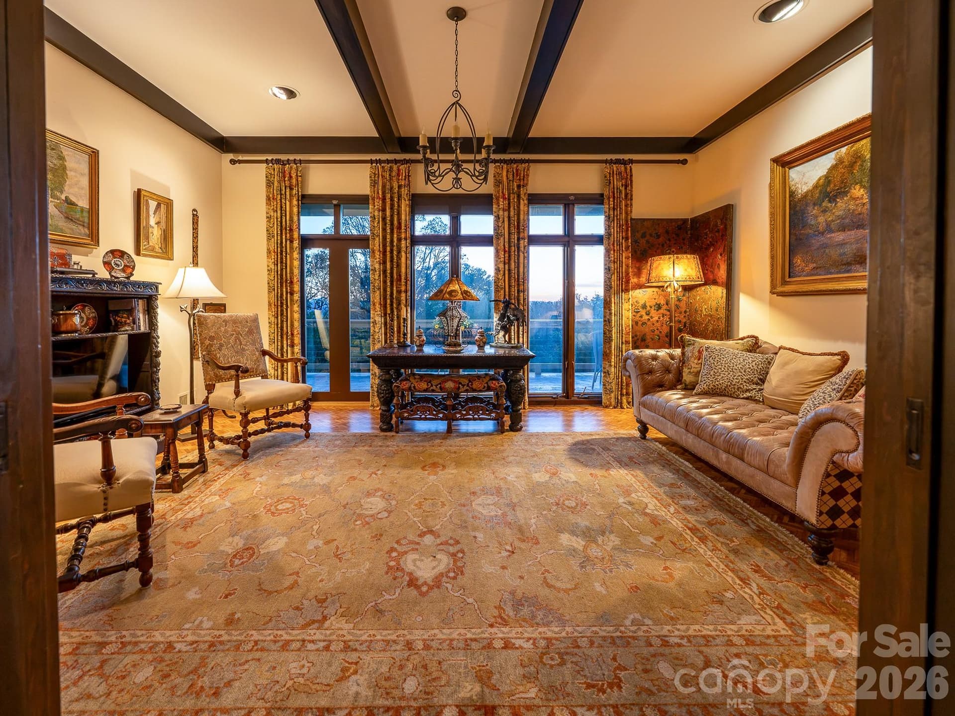 A large den a gathering space designed for conversation, comfort, and endless views - 65 Crestwood Road, Asheville