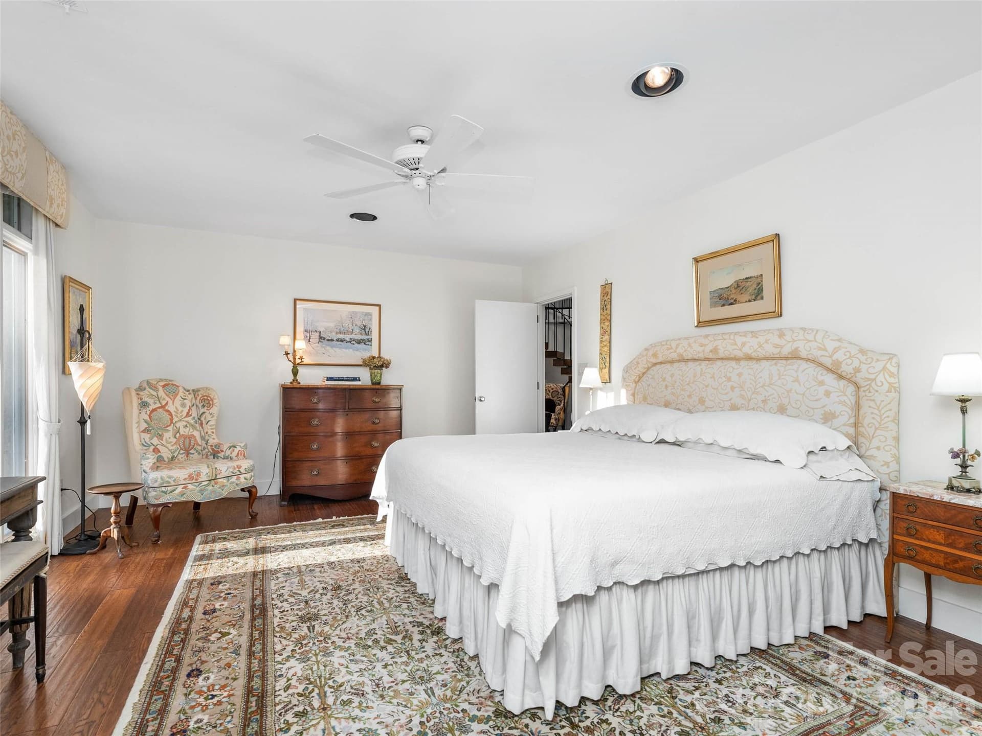 A peaceful bedroom retreat where walls of glass connect the indoors with the beauty beyond. - 65 Crestwood Road, Asheville