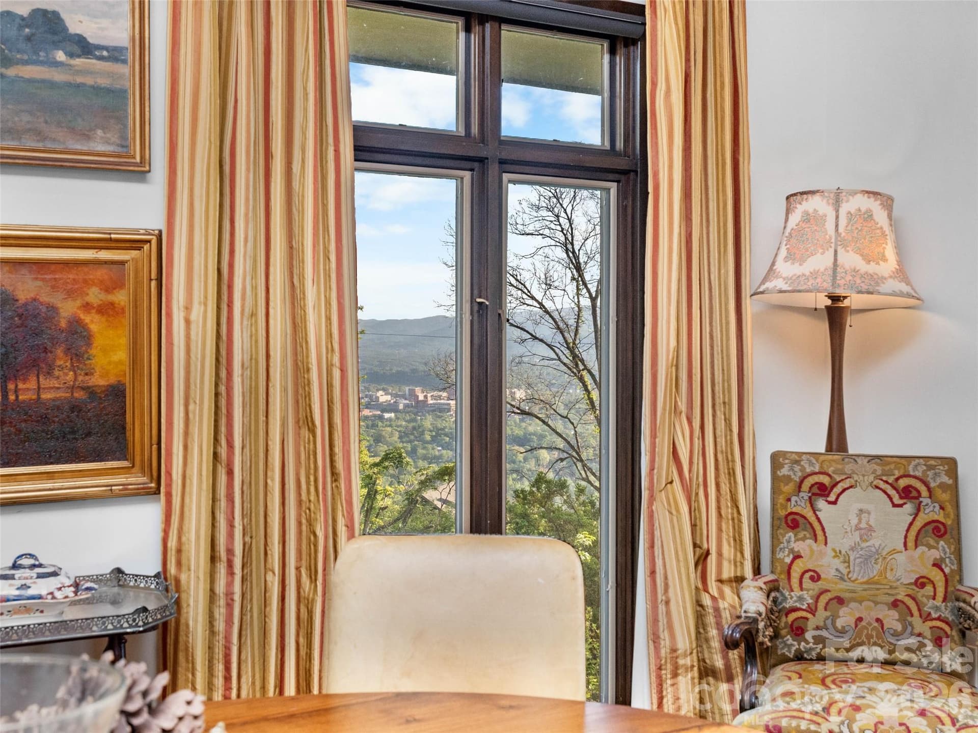 Views of Asheville seen from the dining area and grand open space with fireplace - 65 Crestwood Road, Asheville