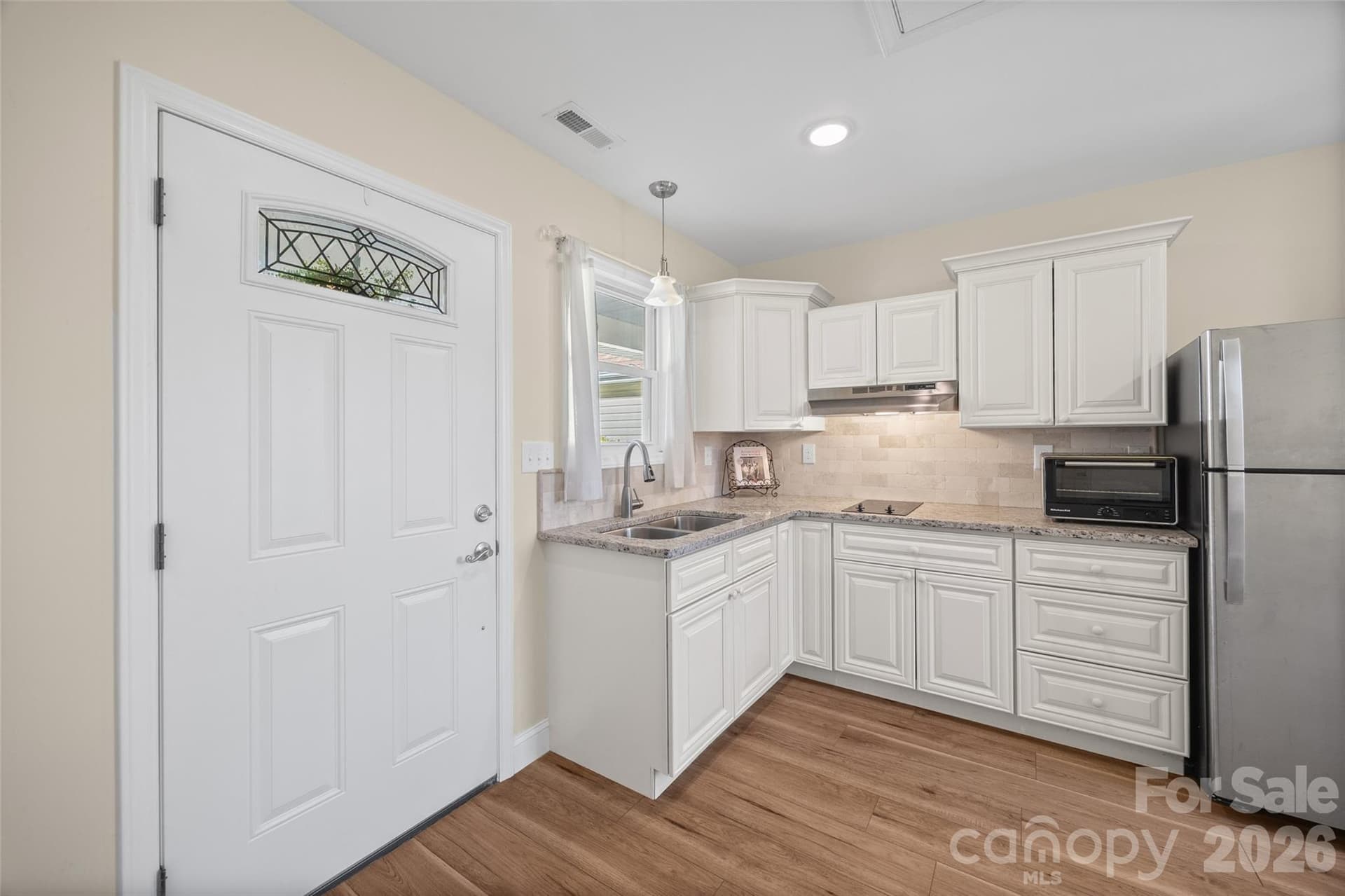 2nd Kitchen. This door is to outside and the covered front porch area. - 3117 Monte Drive, Monroe