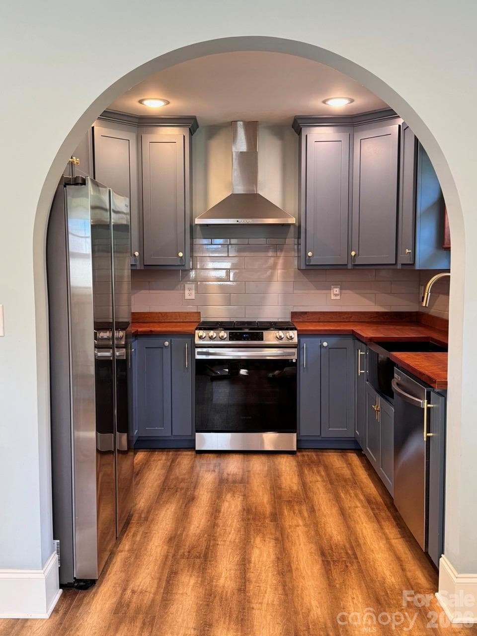 Beautiful archway entry into kitchen. - 52 North Lane, Brevard