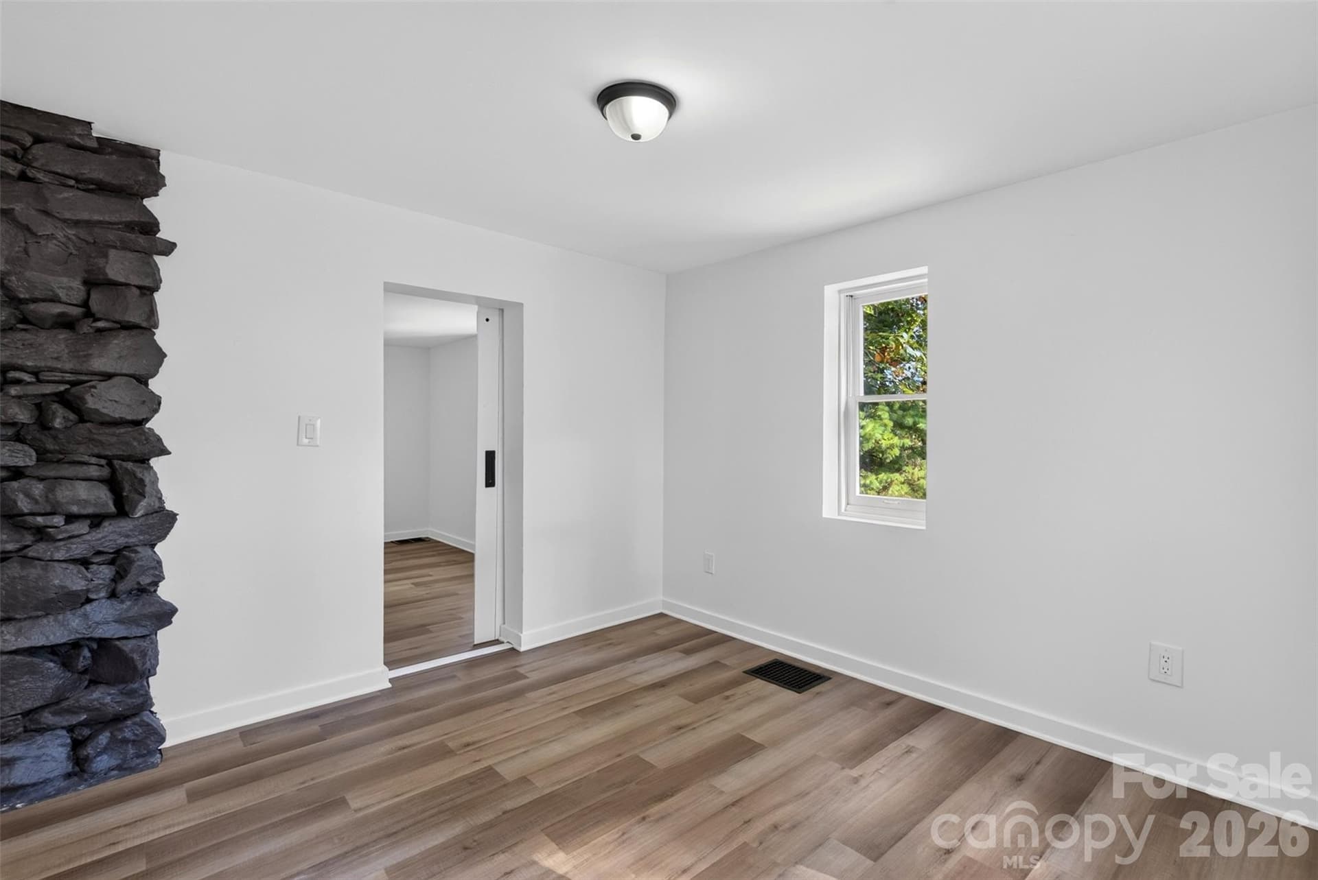 Downstairs flex room off the foyer with a door to the jack and jill bath. - 64 and 56 Pine Cone Drive, Asheville