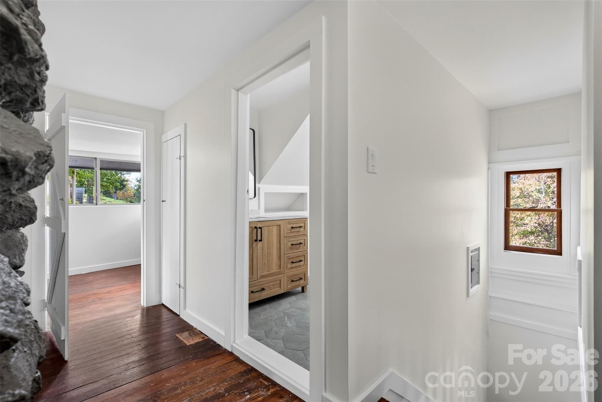 Upstairs has original hardwood floors and a renovated bathroom. - 64 and 56 Pine Cone Drive, Asheville