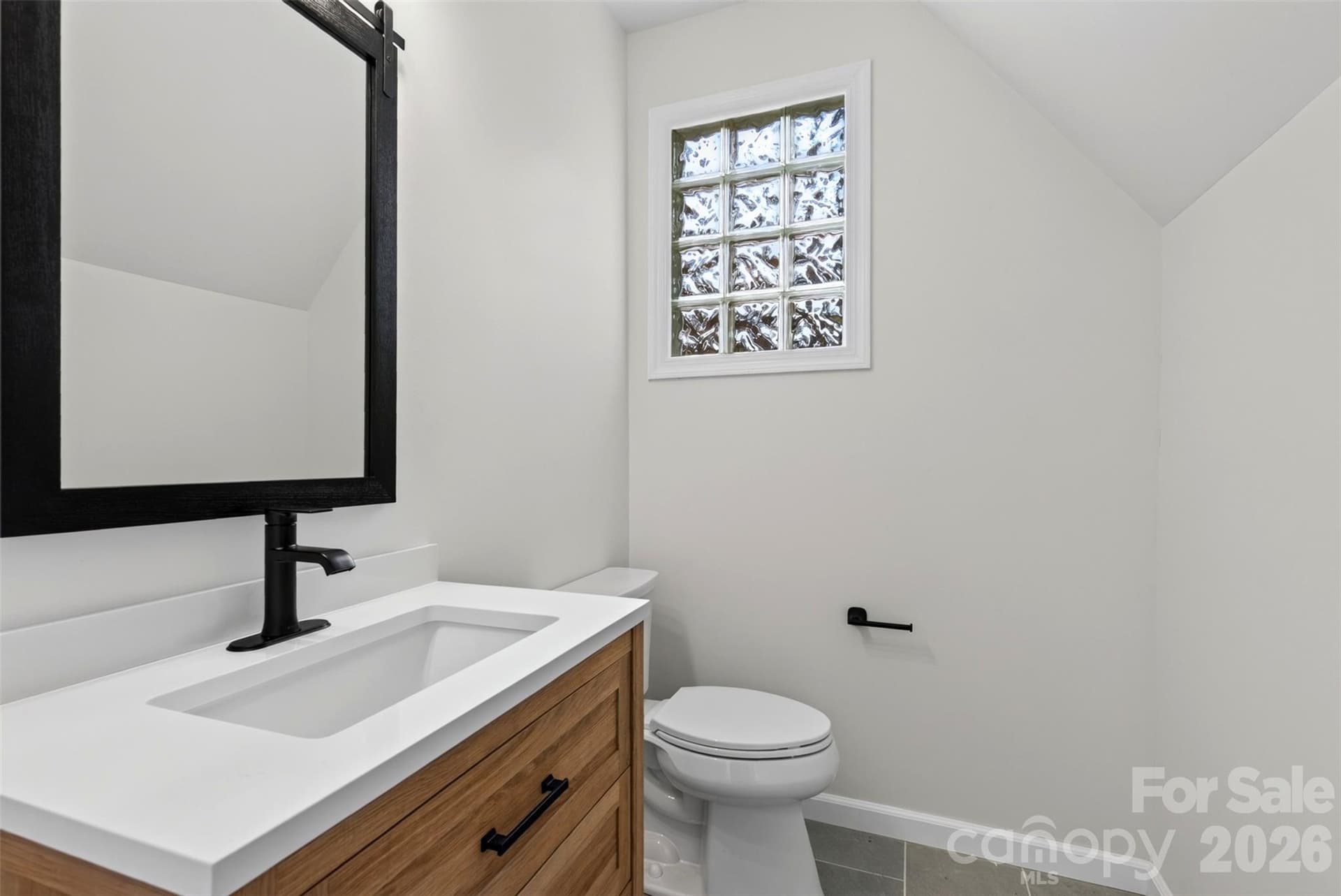 Updated main floor powder room - 64 and 56 Pine Cone Drive, Asheville