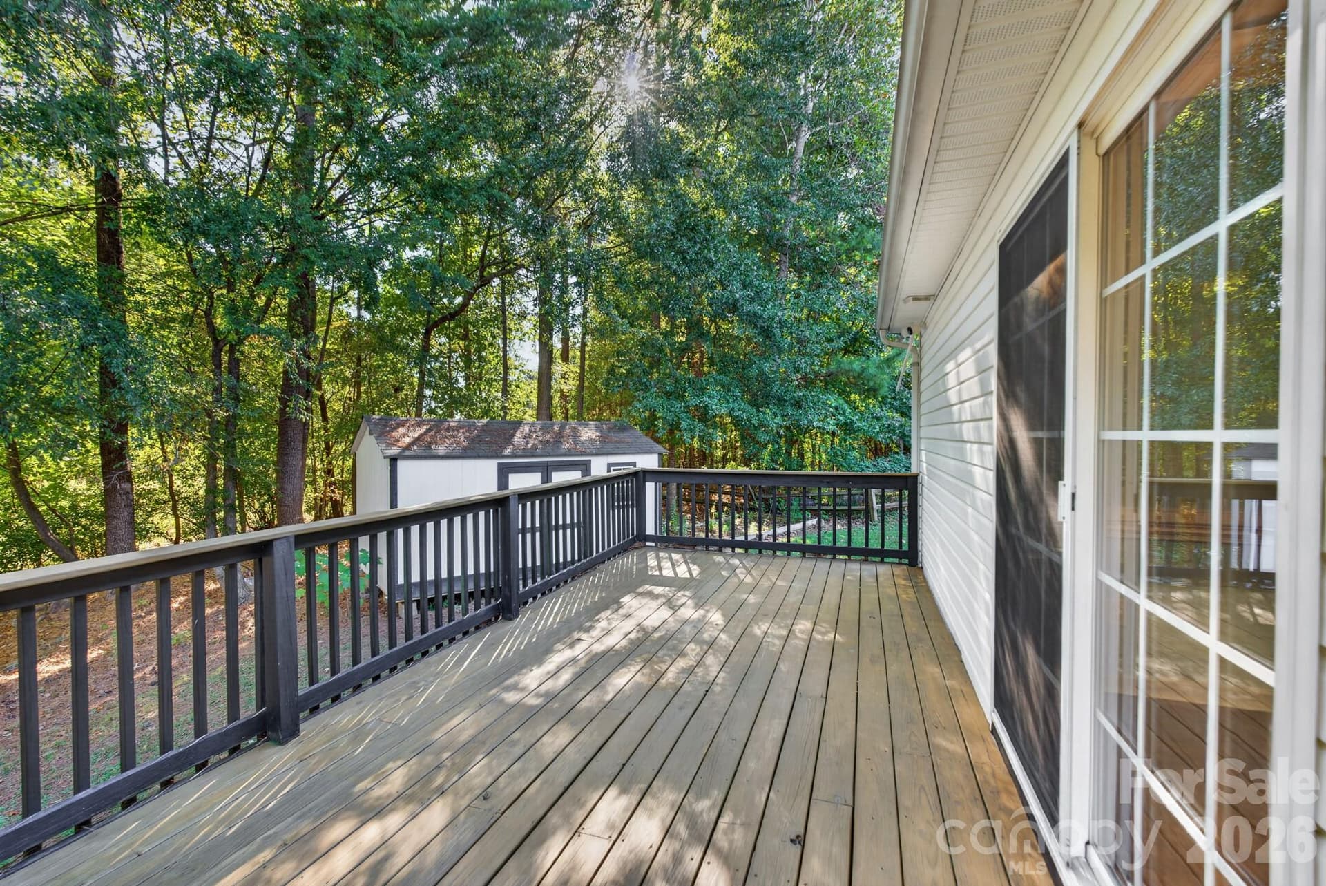 Expansive wooden deck offers plenty of room for patio furniture, dining sets, and outdoor loungers. - 702 Painted Lady Court, Rock Hill