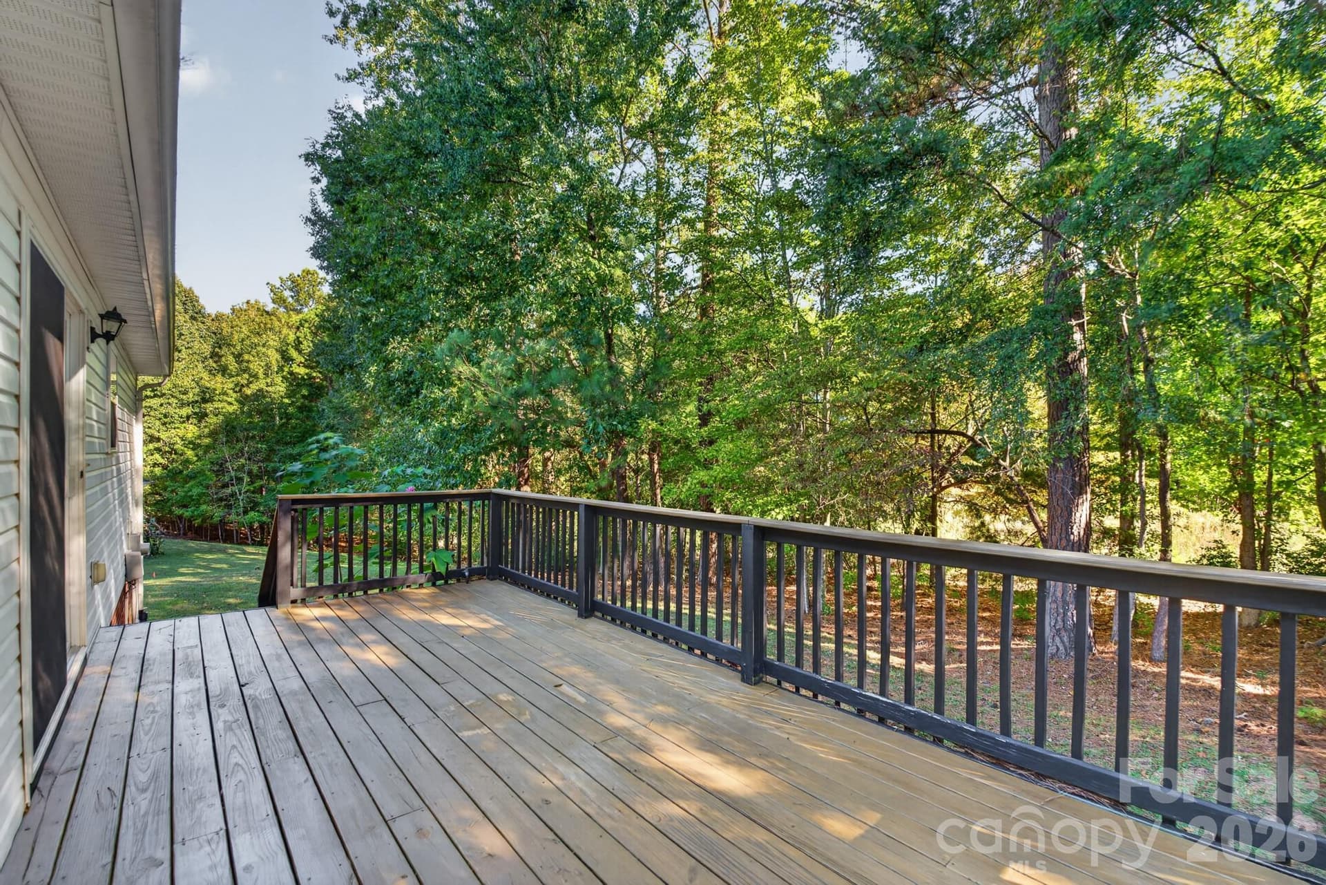 Serene views into the lush, private tree line. - 702 Painted Lady Court, Rock Hill