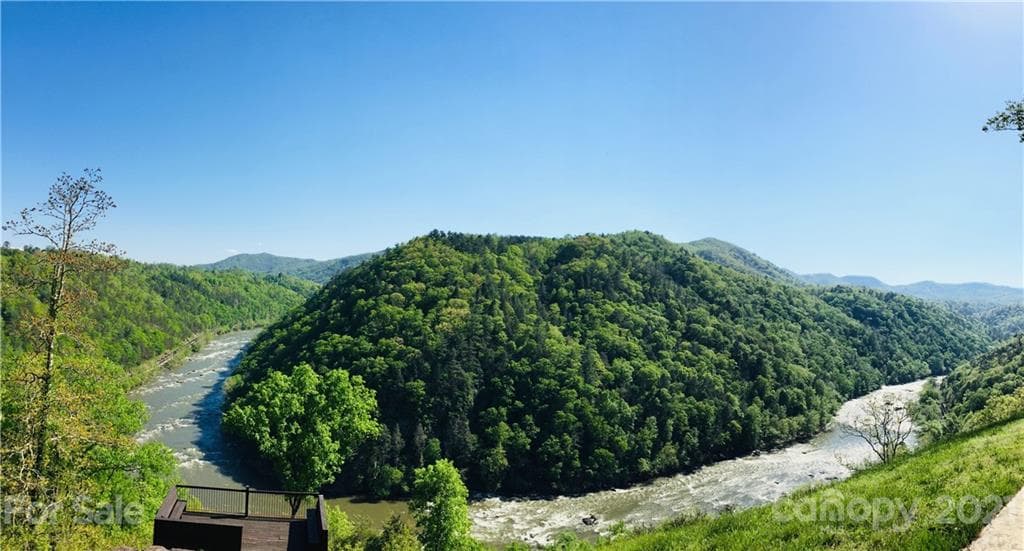 The bend in the mighty French Broad River as viewed from the River Lodge - Marshall