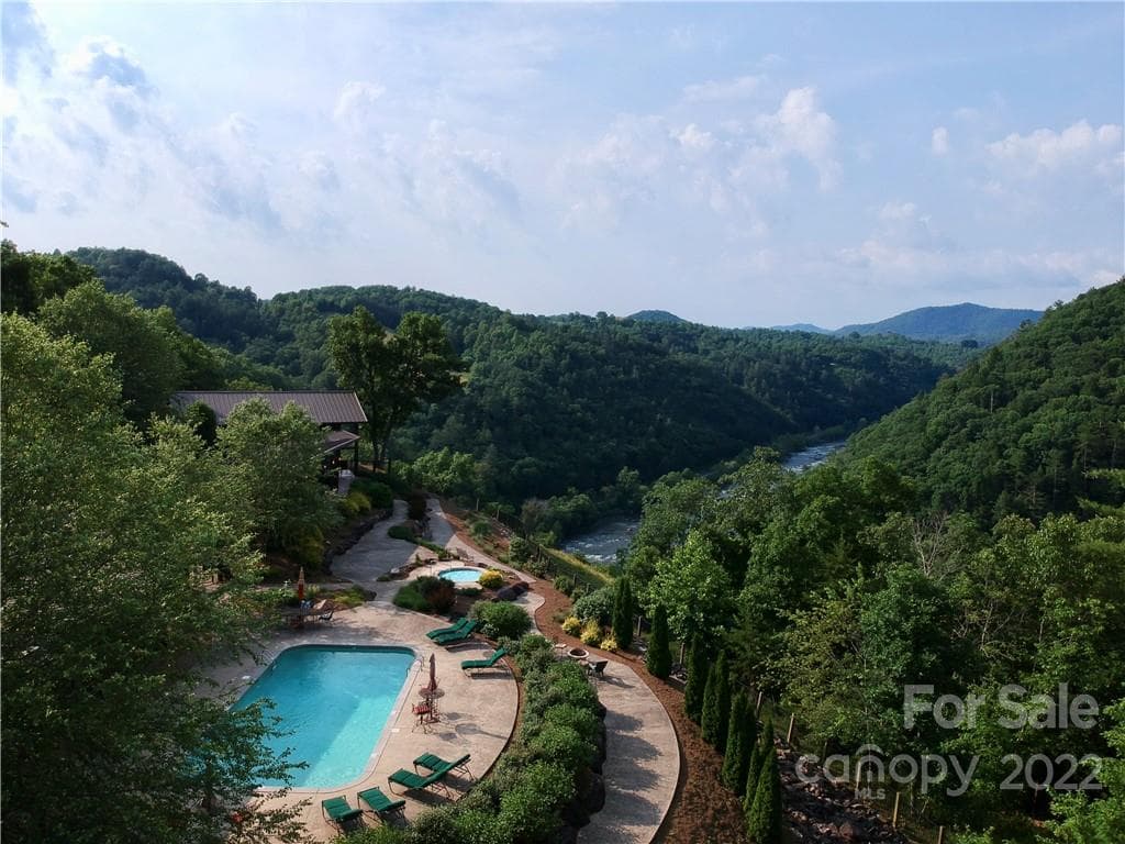 Relax by the pool while taking in the peaceful scenery! - Marshall