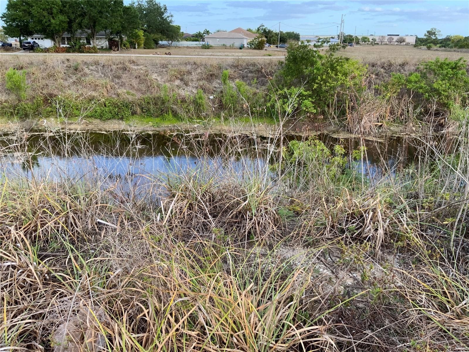 View of Canal - 1830 NE 14TH ST, CAPE CORAL