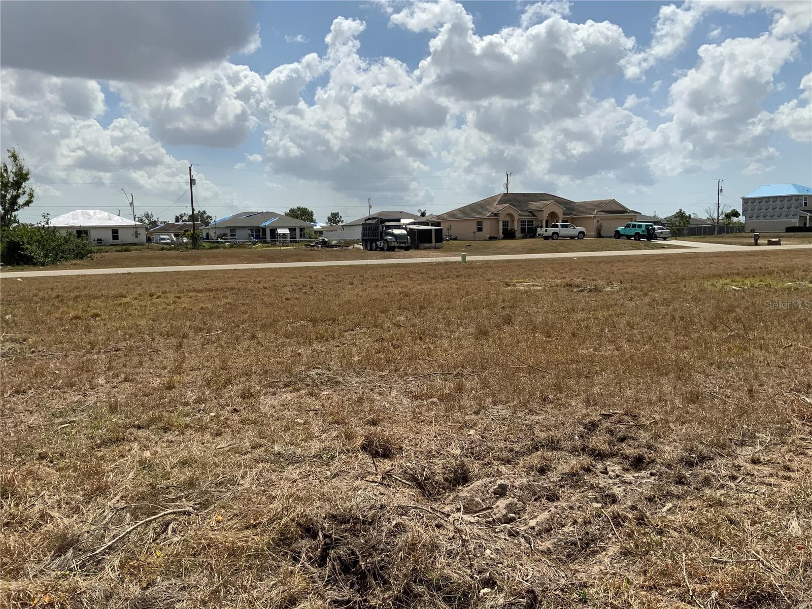Neighborhood View from Back of Lot - 323 NE 31ST ST, CAPE CORAL