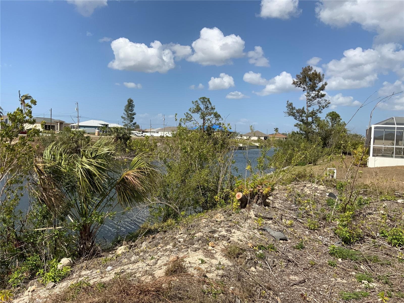 View of Canal from Back Yard - 1708 NW 6TH PL, CAPE CORAL