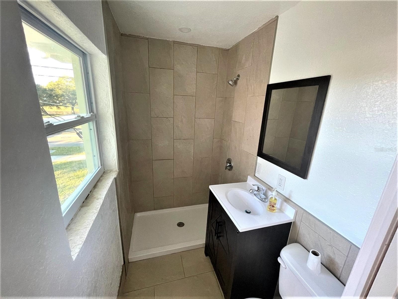 Bath on the upper level. - 5370 71ST ST N, ST PETERSBURG