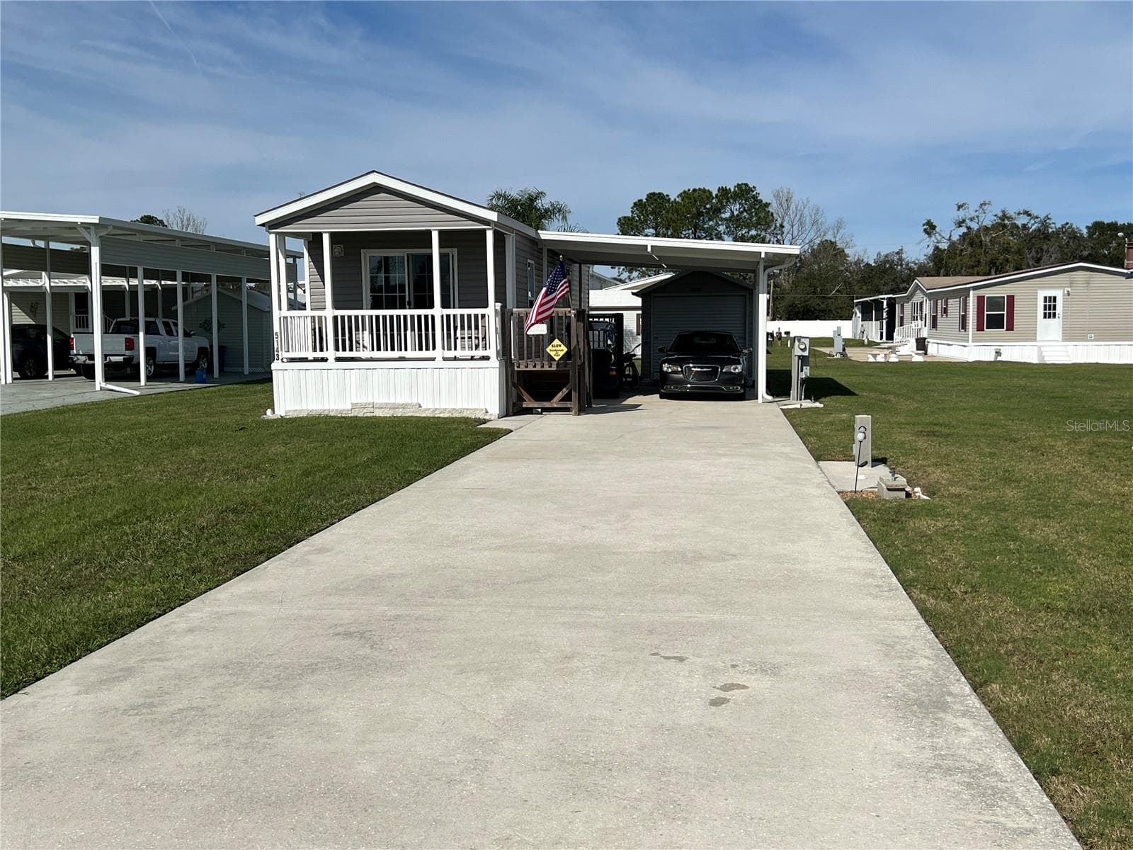 Manufactured Home at 5143 NORTHSHORE DR, POLK CITY, photo 2 of 51