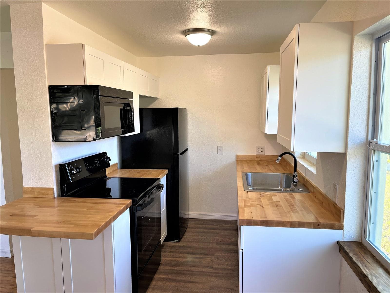 Kitchen. Upper level. - 5370 71ST ST N, ST PETERSBURG