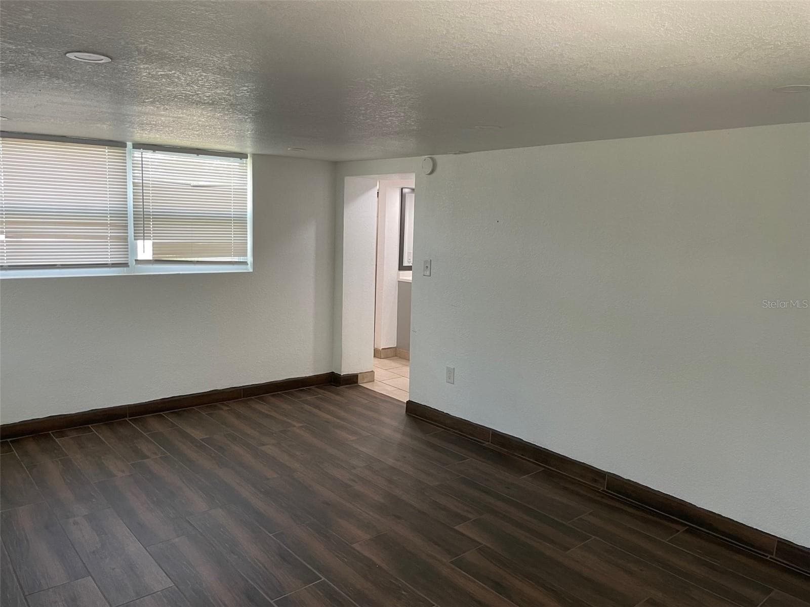 Guest suite or home office w/ private entrance. Door leads to bath w/shower, large closet and then to the garage. - 5370 71ST ST N, ST PETERSBURG