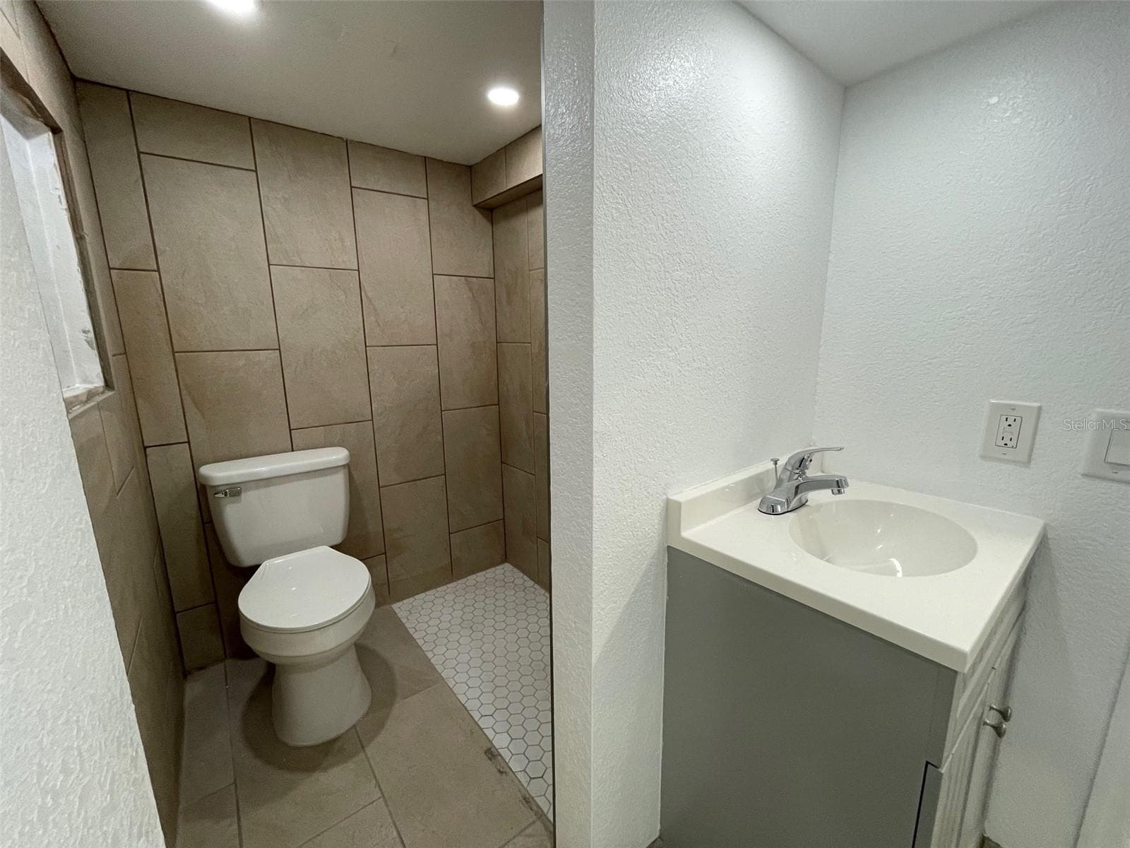 Downstairs bathroom. - 5370 71ST ST N, ST PETERSBURG