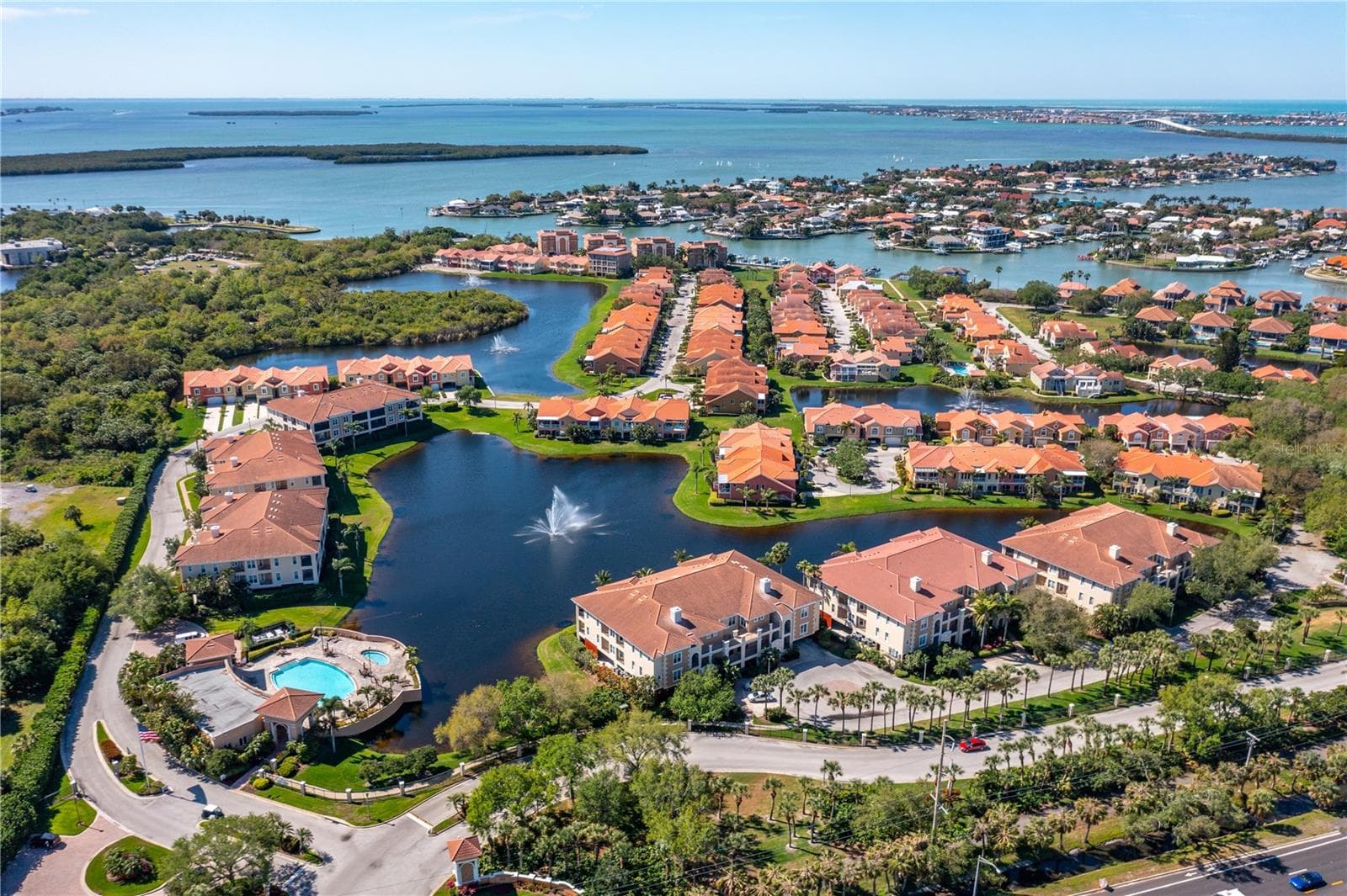 Southerly photo of the Marina Bay community toward the Sunshine Skyway Bridge. - 47A BAYVIEW CT S, ST PETERSBURG
