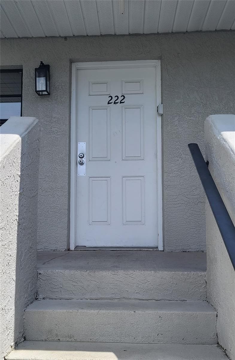 Entry w/nu color bldgs - 101 LAKE AVE NE #222, LARGO