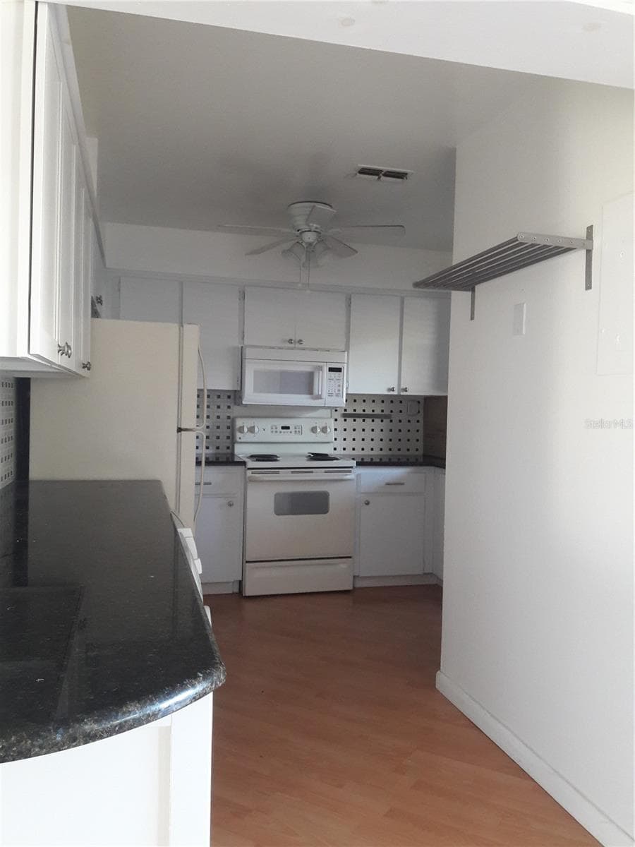 Granite, Wood, Appliances - 101 LAKE AVE NE #222, LARGO