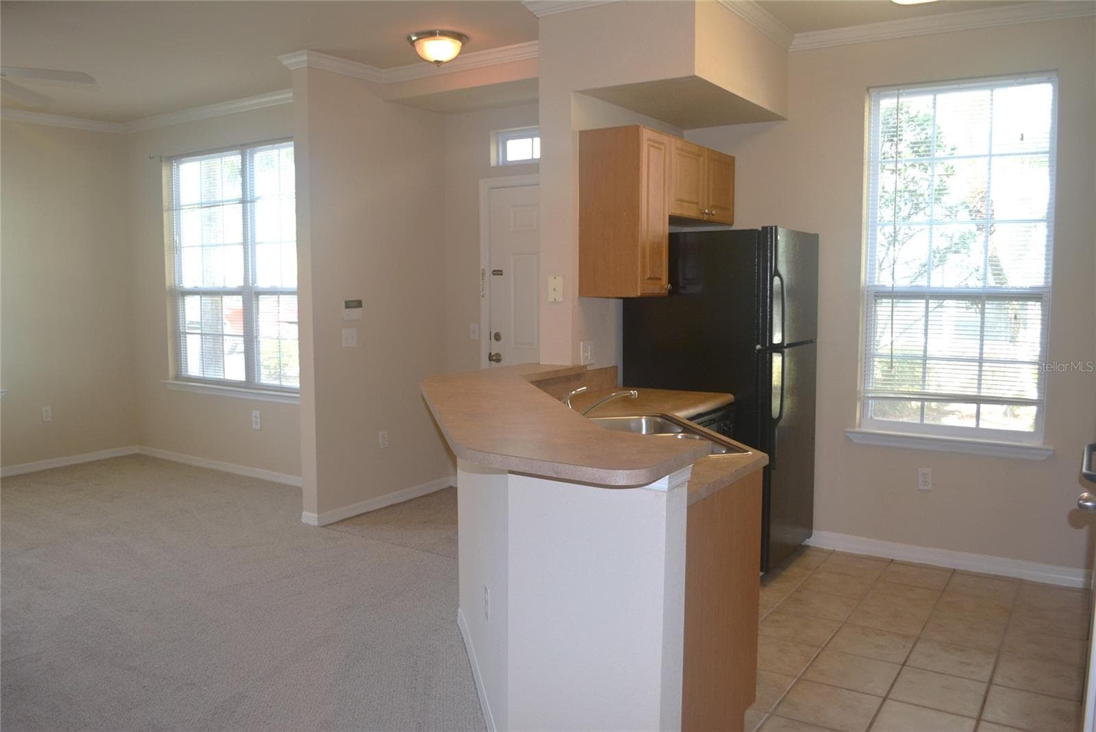 Kitchen and Living Area from Dining Room - 5701 SOLDIER CIR #104, SARASOTA