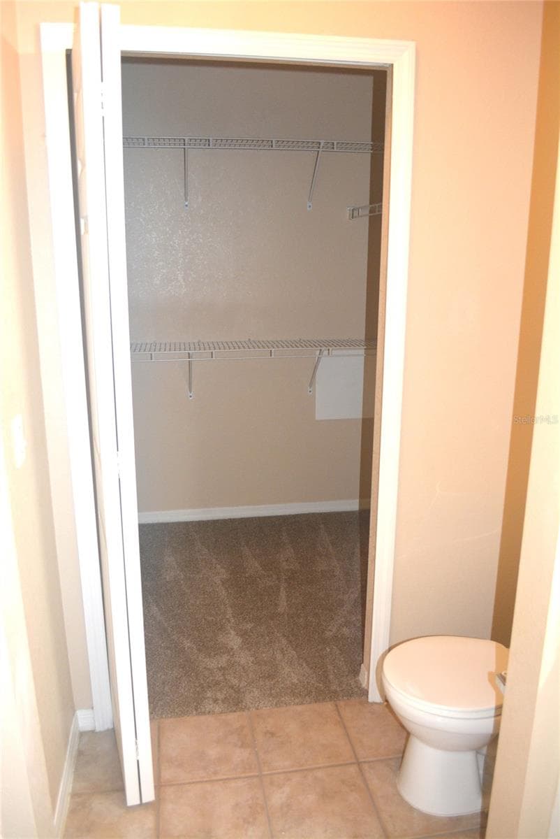 Master Bedroom Walking  Closet in Master Bathroom - 5701 SOLDIER CIR #104, SARASOTA