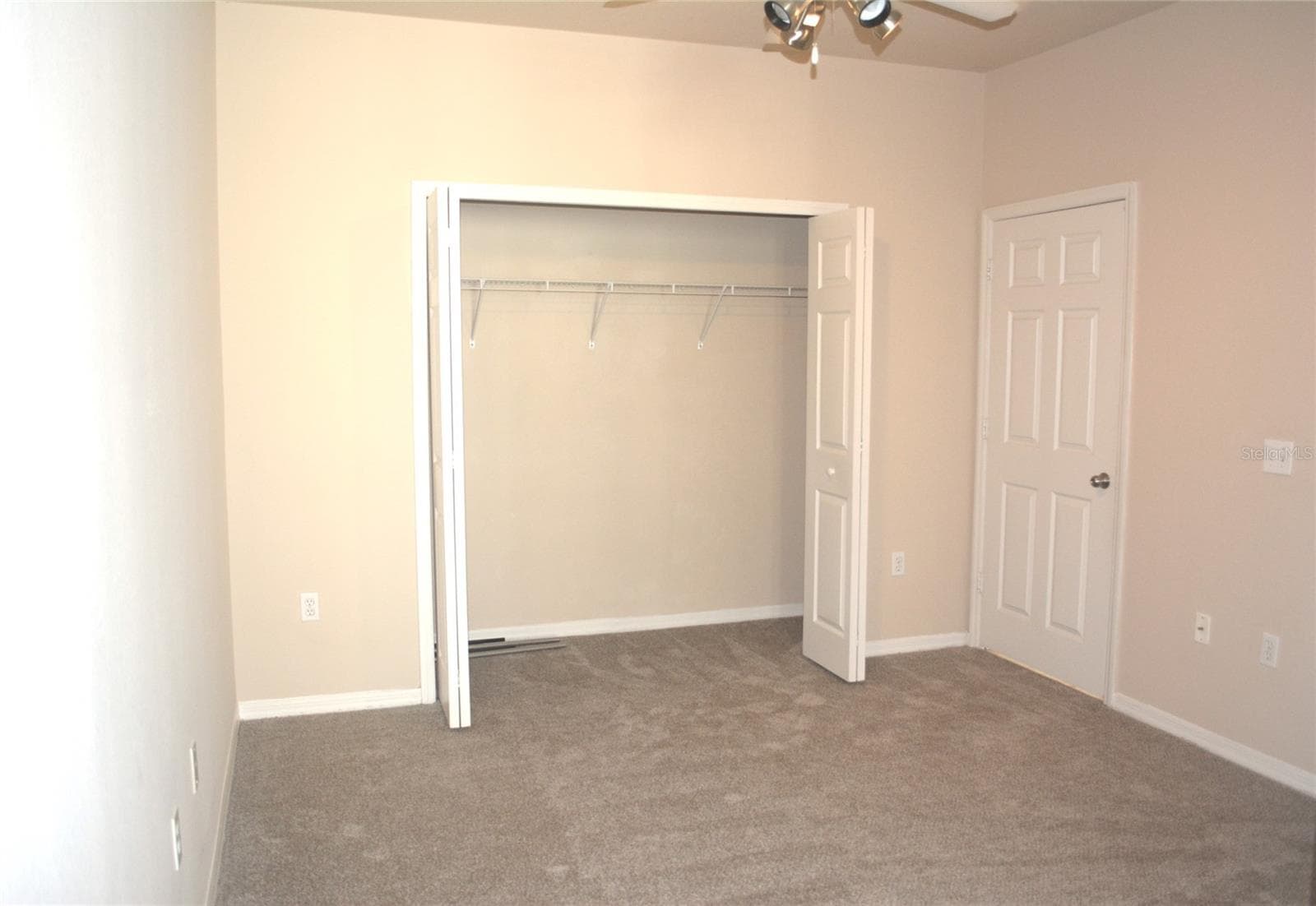 2nd Bedroom closet and access door to 2nd Bathroom - 5701 SOLDIER CIR #104, SARASOTA